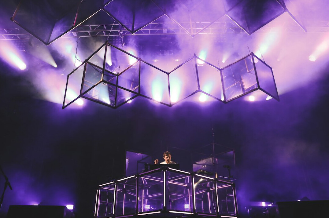 Overhead studio lighting grid above a stage set